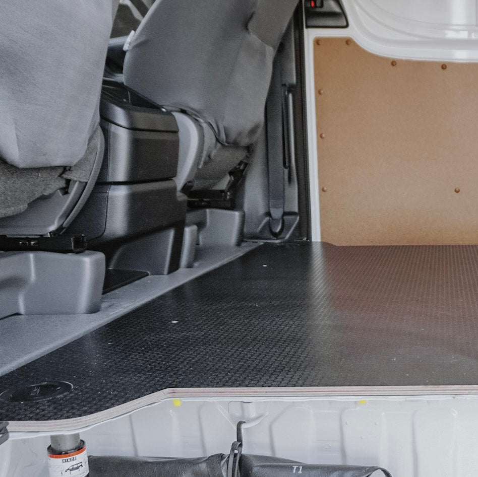 Van interior with folded seats and a flat floor